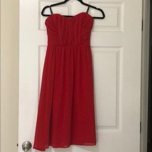 Red strapless tea length dress